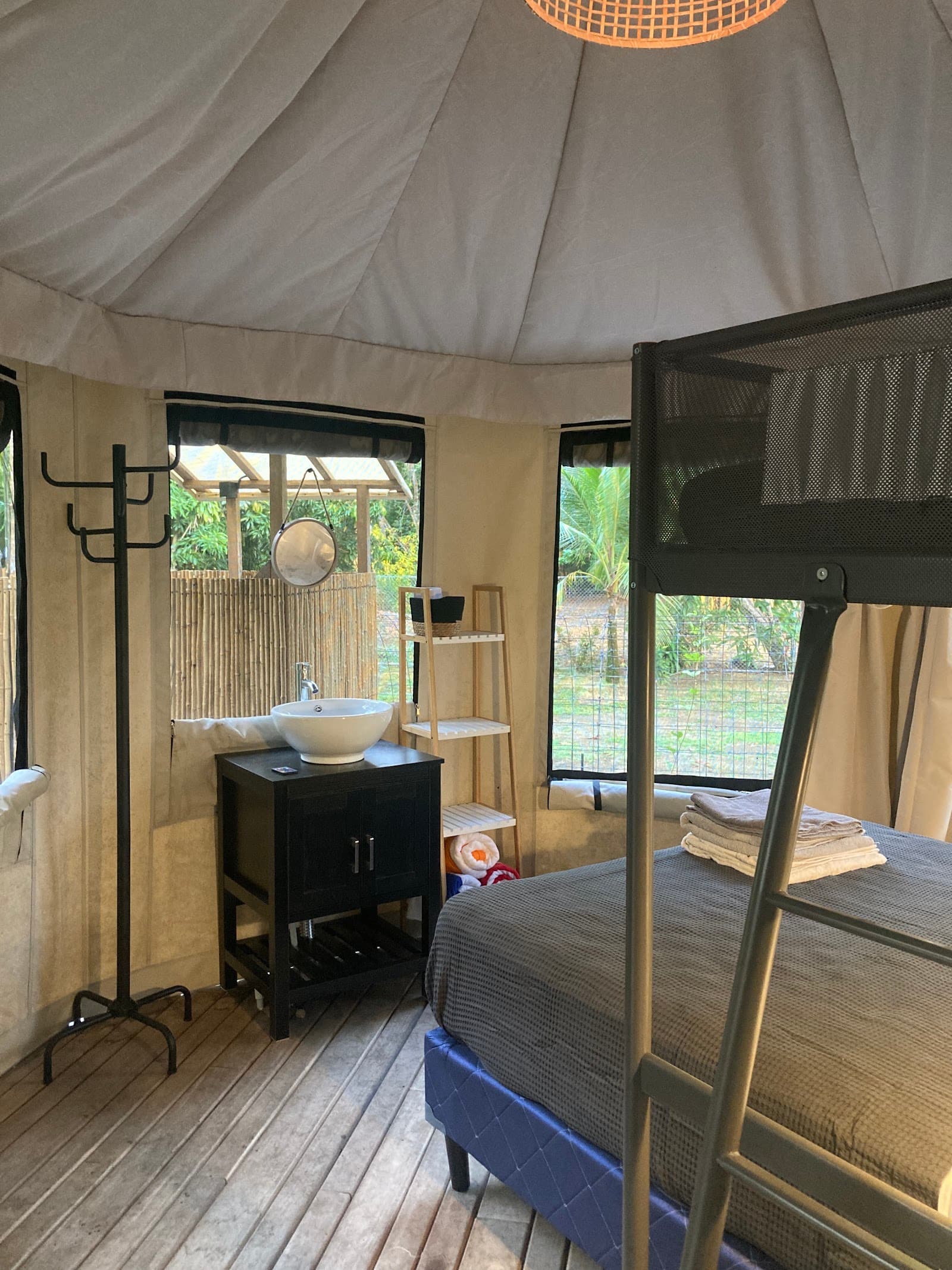 View from inside a safari tent towards the plunge pool